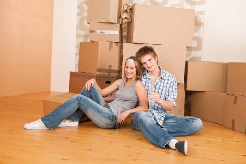 Removal van loading household furniture for a home move in West Heath