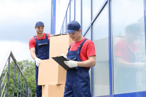 Removal team preparing a house move in West Heath