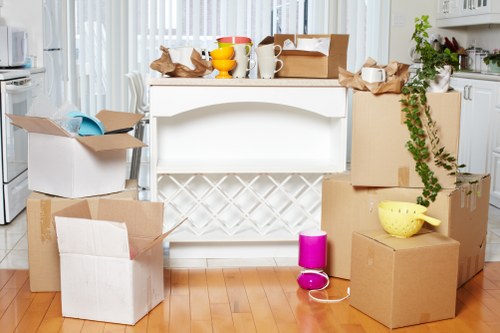 Professional movers handling furniture in West Heath