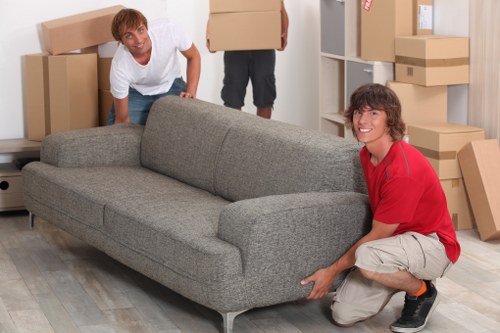 Local removal team handling a move on a residential West Heath street